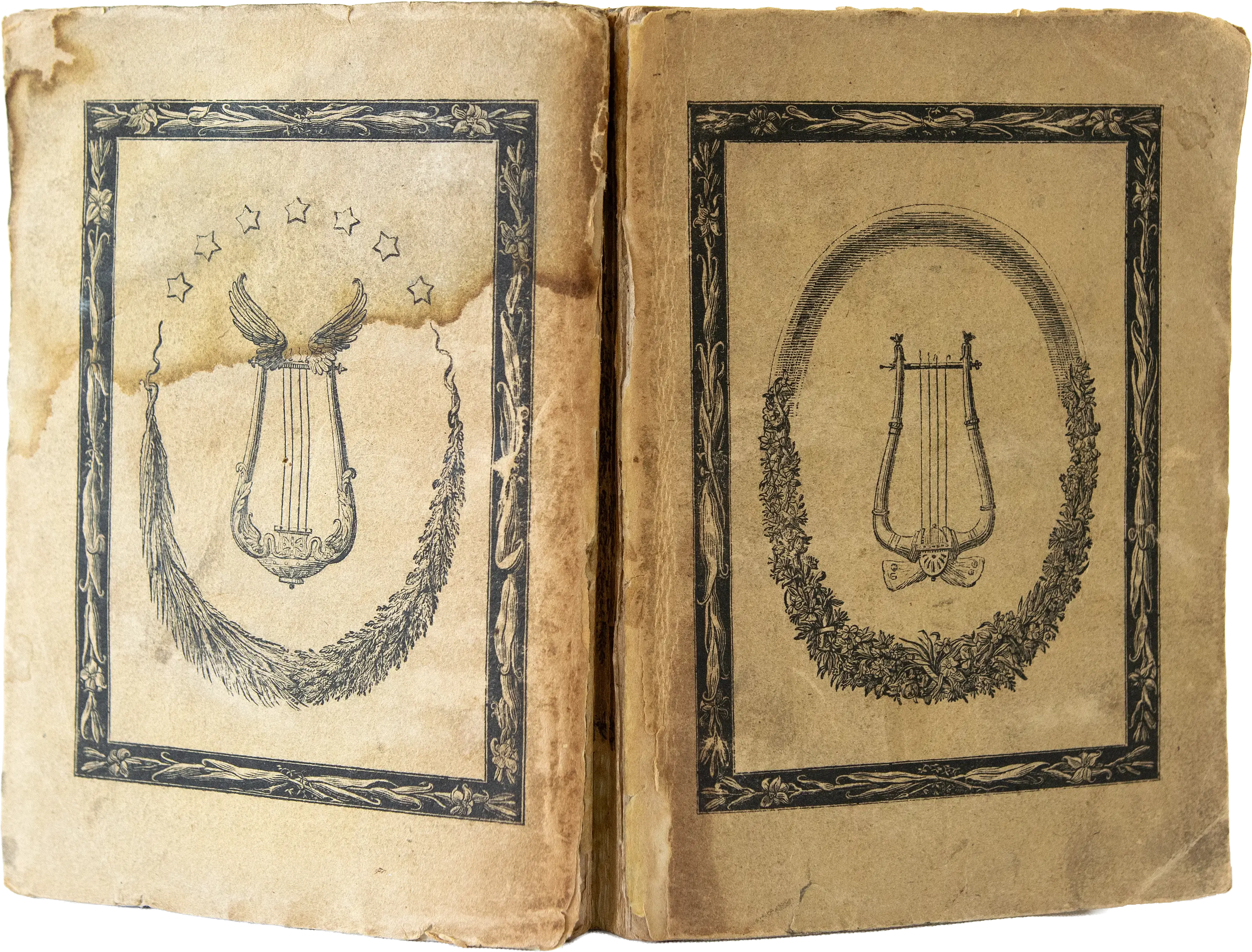 Aufgeschlagenes Vorsatzpapier von Friedrich Girardets Übertragung der Allemannischen Gedichte mit einem kleinen schwarzen Titelschild.