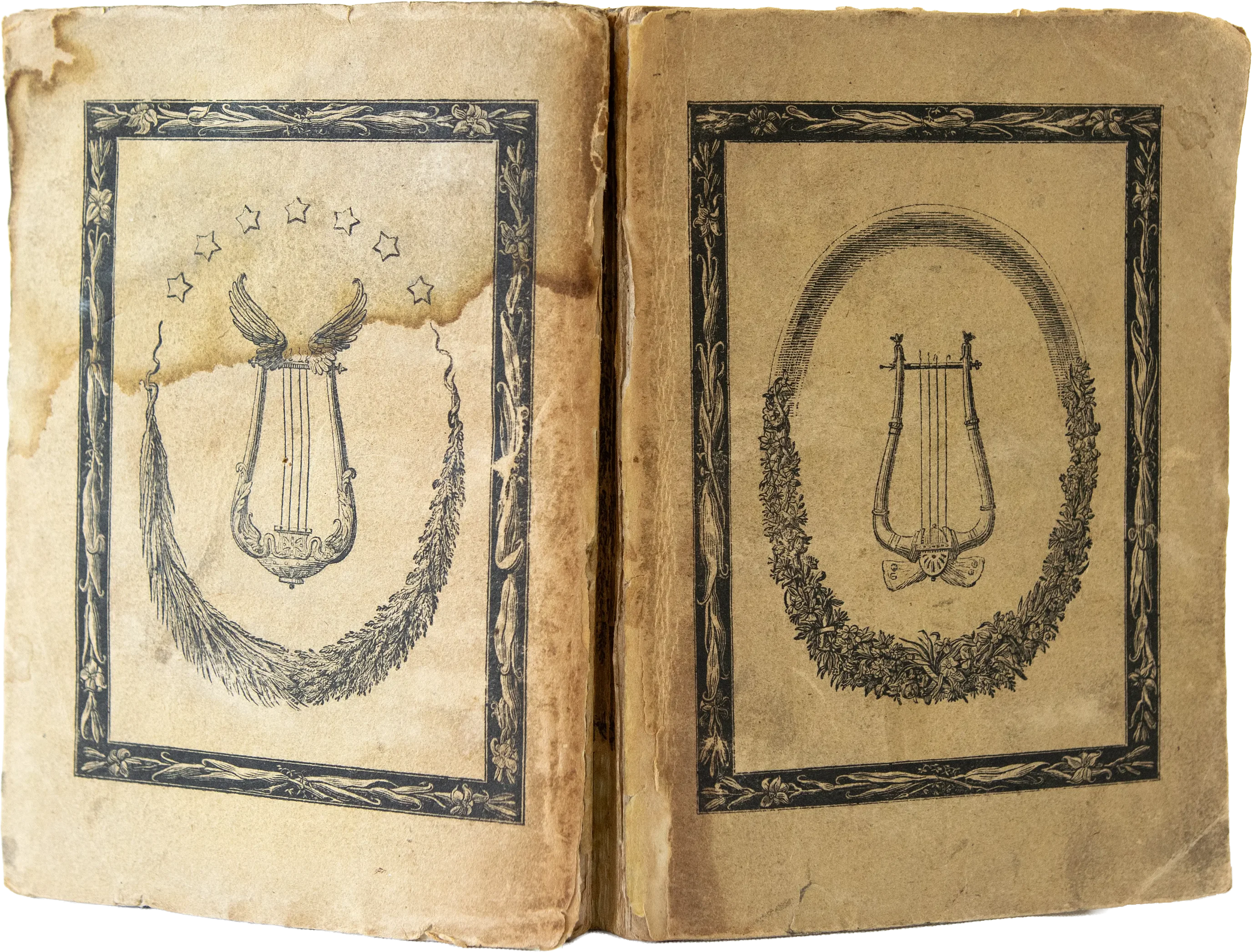 Aufgeschlagenes Vorsatzpapier von Friedrich Girardets Übertragung der Allemannischen Gedichte mit einem kleinen schwarzen Titelschild.